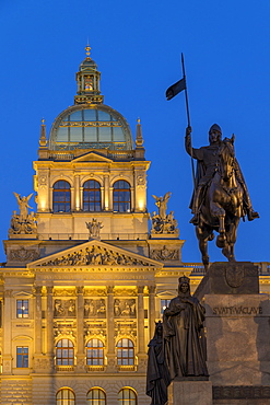 The illuminated National Museum (Narodni Muzeum) and the statue of St. Wenceslas at dusk, Prague, Bohemia, Czech Republic