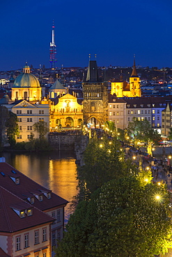 View from the Lesser Town Bridge Tower over Charles Bridge and the old town at dusk, UNESCO World Heritage Site, Prague, Bohemia, Czech Republic, Europe