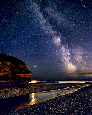 Milky Way with Mars set against Otter Head and River Otter at Budleigh Salterton, Devon, England, United Kingdom, Europe