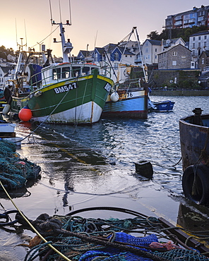 High tide at dawn in the harbour of the fishing port of Brixham, Devon, England, United Kingdom, Europe