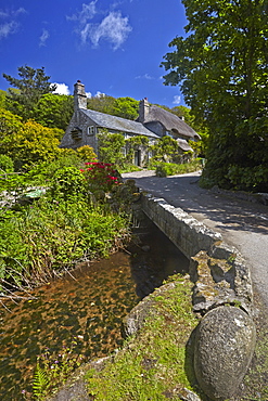 A thatched Cornish cottage on the road to Penberth Cove, Cornwall, England, United Kingdom, Europe