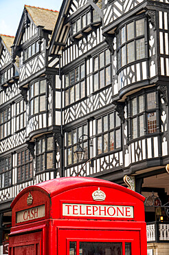 Telephone box on Northgate Street with historic buildings, Chester, Cheshire, England, United Kingdom, Europe