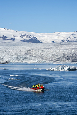 Boat tour on Jokulsarlon Glacier Lagoon, with Breidamerkurjokull Glacier behind, South East Iceland, Iceland, Polar Regions