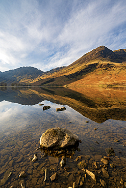 Lake Buttermere with mirrored reflections at sunrise, Lake District National Park, Cumbria