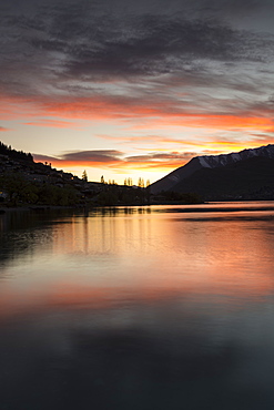 Queenstown and Bob's Peak with dramatic sky at sunrise, Otago, South Island, New Zealand, Pacific