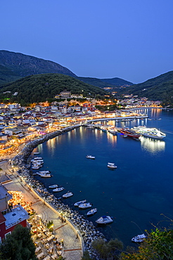 Elevated view of Parga town at night, Parga, Preveza, Greece, Europe