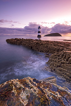 Sunrise over Penmon Point lighthouse, Anglesey, North Wales, United Kingdom, Europe