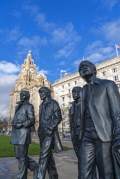 Bronze statues of the Beatles stand on Liverpool Waterfront, Liverpool, Merseyside, England, United Kingdom, Europe