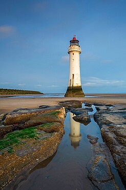 Perch Rock Lighthouse reflected in rockpool, New Brighton, Cheshire, England, United Kingdom, Europe