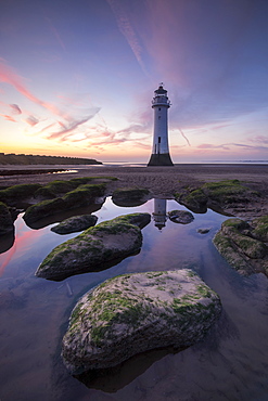 Perch Rock Lighthouse at New Brighton reflected with dramatic sunset, New Brighton, Cheshire, England, United Kingdom, Europe