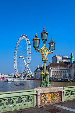 View of lamp post on Westminster Bridge with The London Eye, Westminster, London, England, United Kingdom, Europe