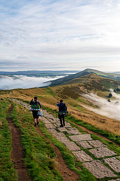 Hikers on The Great Ridge with cloud inversion, Edale, The Peak District, Derbyshire, England, United Kingdom, Europe