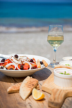 Cypriot Village Salad by the sea served with pitta bread and white wine, Cyprus, Mediterranean, Europe