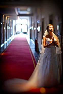 Hispanic bride getting ready on her wedding day