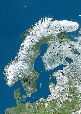 Satellite view of Northern Europe showing Scandinavia and the Baltic States in winter, with partial snow cover. This image was compiled from data acquired by Landsat 7 & 8 satellites.