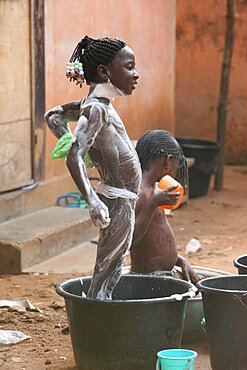 Bathing in an african house.