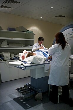 Technician Taking MRI of Arm after Doppler