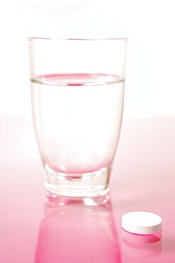 Effervescent tablet and glass of water