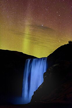 Northern Lights above Skogafoss waterfall, Iceland