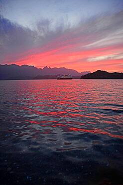 Boat in Sea of Cortez at sunset, Baja California, Mexico