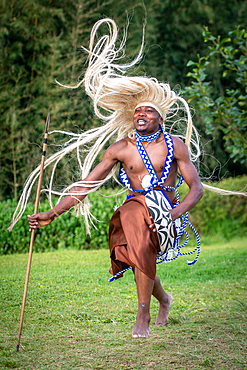 Intore Traditional dance performed outdoors near Volcanoes National Park in Rwanda