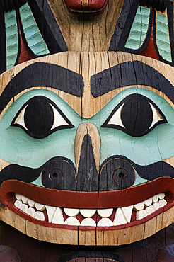 Detail of Tlingit totem pole at Saxman Totem Park, Ketchikan, Alaska.