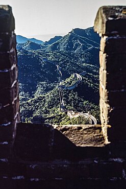 Classic Chinese architecture in the tiled roof of a building in Mutianyu, China.