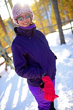 Young attractive woman in Pyha ski resort, Lapland