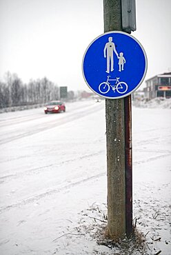 Traffic sign and car in winter, Inari, Lapland