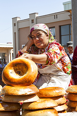 Woman selling non bread, Siyob Market, also known as Siab Market, Samarkand, Uzbekistan