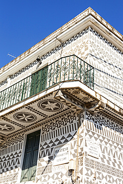 Decorative walls and balcony of a building in the village of Pyrgi, Chios, Greece