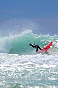 Sunset surfing on Cote des Basques beach, Biarritz