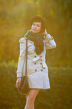 Young eurasian woman at sunset