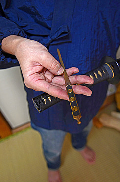 Japanese Sword Scabbard (Koshirae) Maker, Atsuhiro Morii, working at his workshop. Yokohama, Japan