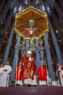 Bishop blessing the palms,mass,Palm Sunday.Interior of Basilica Sagrada Familia, Barcelona, Catalonia, Spain