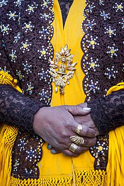 Angela la Folclorista, detail of her dress and hands, cholita female wrestler, El Alto, La Paz, Bolivia