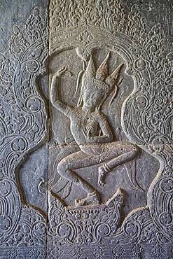 Aspara sculpture in bas-relief on the wall, in Angkor Wat, Siem Reap, Cambodia