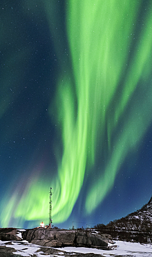 The Aurora Borealis (Northern Lights) over Tungeneset Lighthouse, Tungeneset, Senja, Troms og Finnmark county, Norway, Scandinavia, Europe