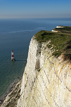 Beachy Head Lighthouse and Beachy Head from the cliff top, near Eastbourne, South Downs National Park, East Sussex, England, United Kingdom, Europe