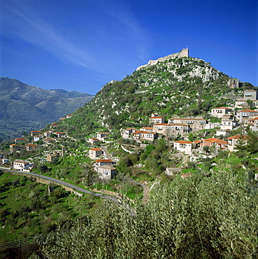 Houses on the hill, and the castle on the summit, at the town of Karitena in the Peloponnese, Greece, Europe