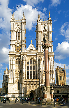Towers and frontage of Westminster abbey church with Victoria Tower in background, Westminster, London, England, UK
