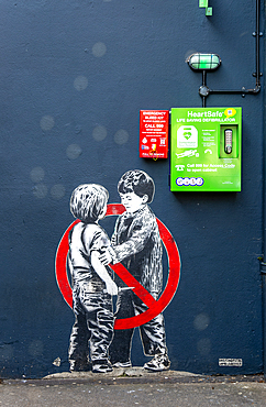 Mural street art two young boys one with knife Anti knife piece 2020 by JPS artist Jamie Scanlon, Frogmore Street, Bristol, England, UK