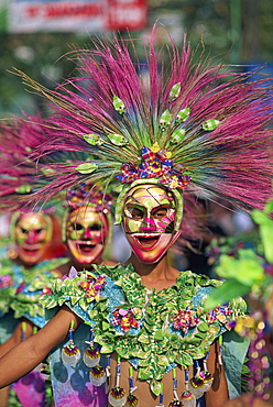 Portrait of a masked dancer in colourful costume at Mardi Gras carnival, in Iloilo City on Panay Island, Philippines, Southeast Asia, Asia