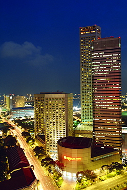 Tower and skyline at night, Raffles City, Singapore, Southeast Asia, Asia