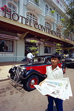 Hotel Continental and newsboy, Saigon, Vietnam, Indochina, Southeast Asia, Asia