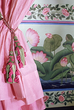 Tassels, pink curtains and painted walls, the Shiv Niwas Palace Hotel, Udaipur, Rajasthan state, India, Asia