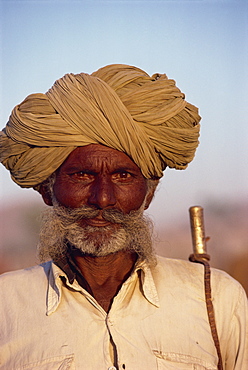 Camel herder, Pushkar Fair, Rajasthan state, India, Asia