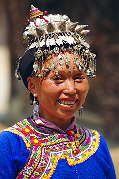 Portrait of a Miao woman with silver headdress, Duyuu, Guizhou Province, China