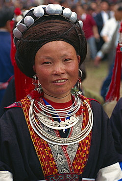 Young Miao woman in finery of silver, Pingtang, Guizhou, China, Asia