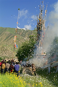 Renewing prayer flags at Labrang, Gansu, China, Asia